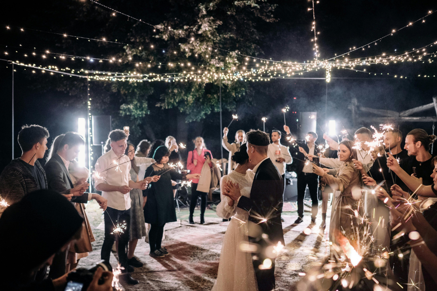 guests enjoying  the couples dancing in their small wedding